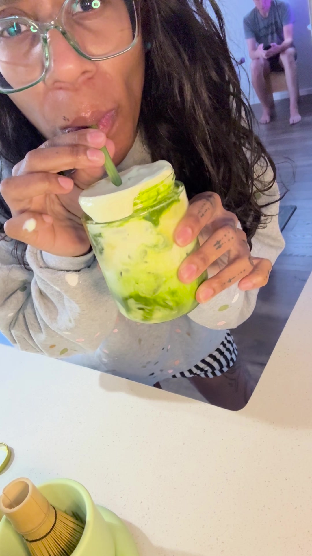 OyaJava’s actual layered mango matcha, photographed in her kitchen.